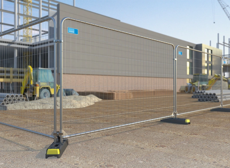 Temporary mesh construction anti-climb fencing with stabilising feet around an active building site